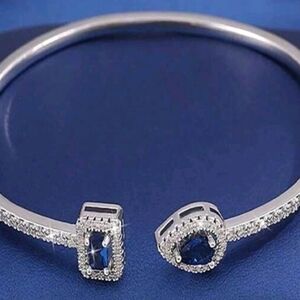 Sleek Silver Bracelet with Blue Accents